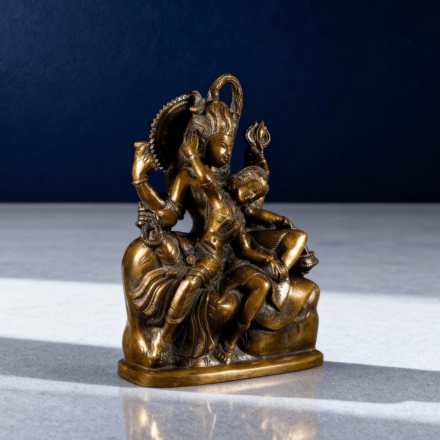 Brass Shiva Parvati sitting idol with detailed carving front view