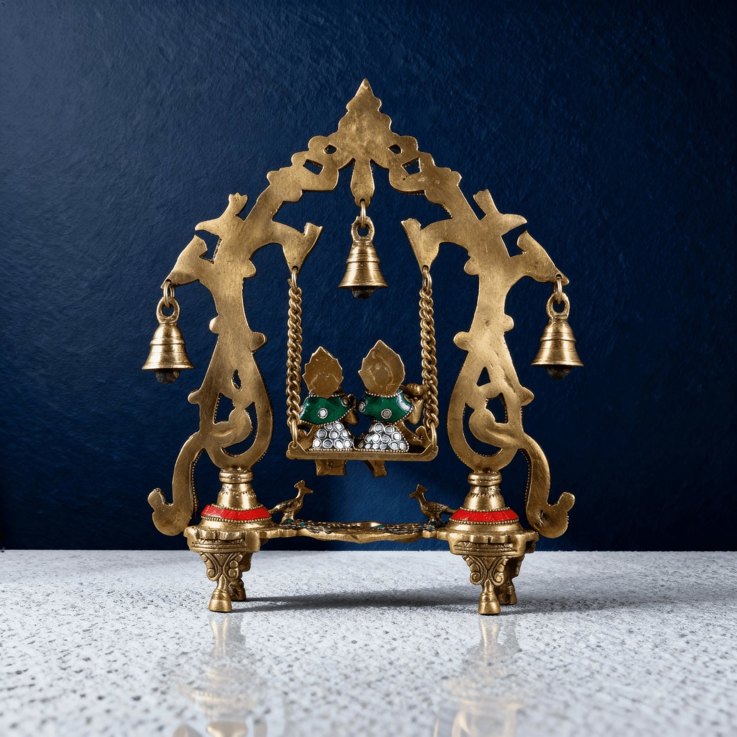 Back view of meenakari brass Radha Krishna jhula idol with engraved detailing