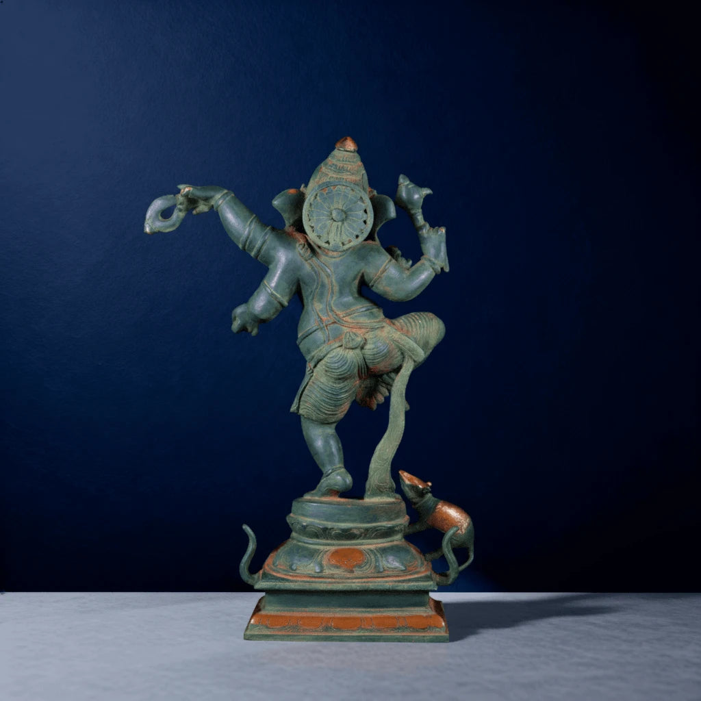Back view of antique-style green Ganesha idol with detailed carvings and bronze-accented pedestal