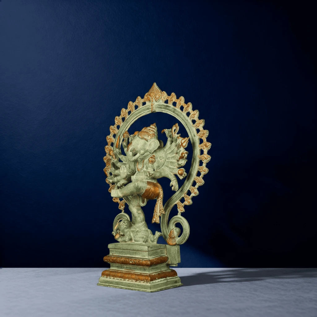 Right angle shot of oxidized Ganesha murti with intricate halo and detailed golden accents on pedestal