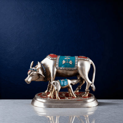 Brass cow and calf idol with red and turquoise enamel detailing on marble base – traditional Indian home decor statue