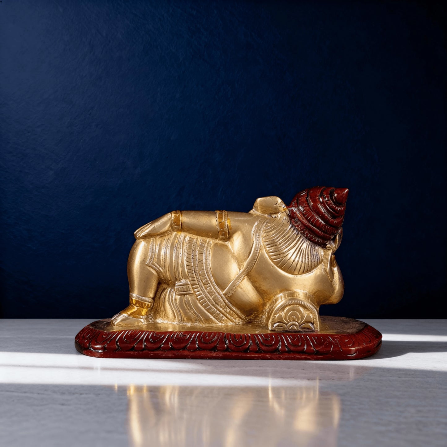 back view reclining ganesha brass idol red finish