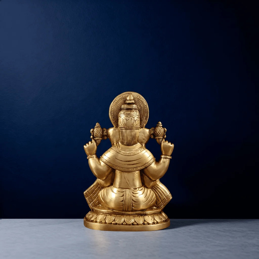 Back view of pure brass Ganesha idol with detailed carvings and traditional Indian craftsmanship