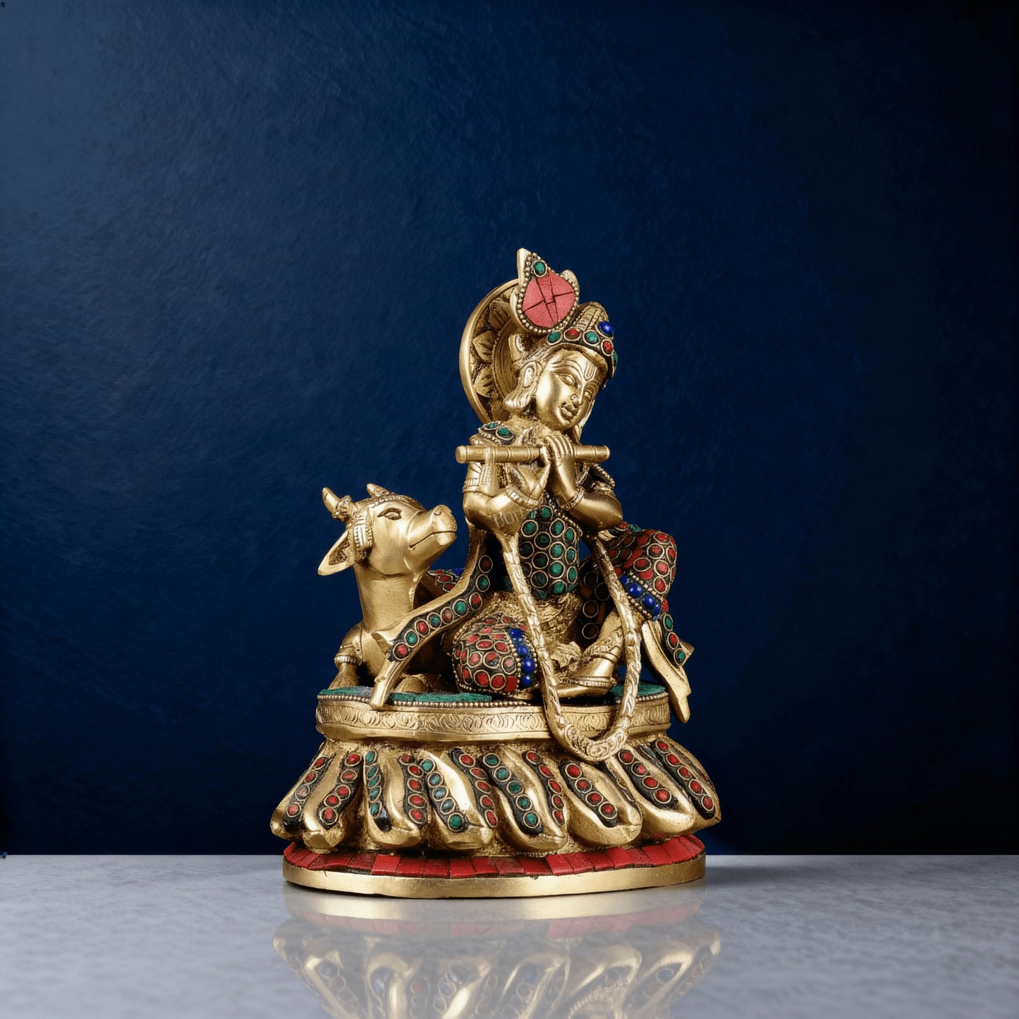 Front view of Krishna with cow idol, handcrafted brass with antique finish and decorative stone inlay